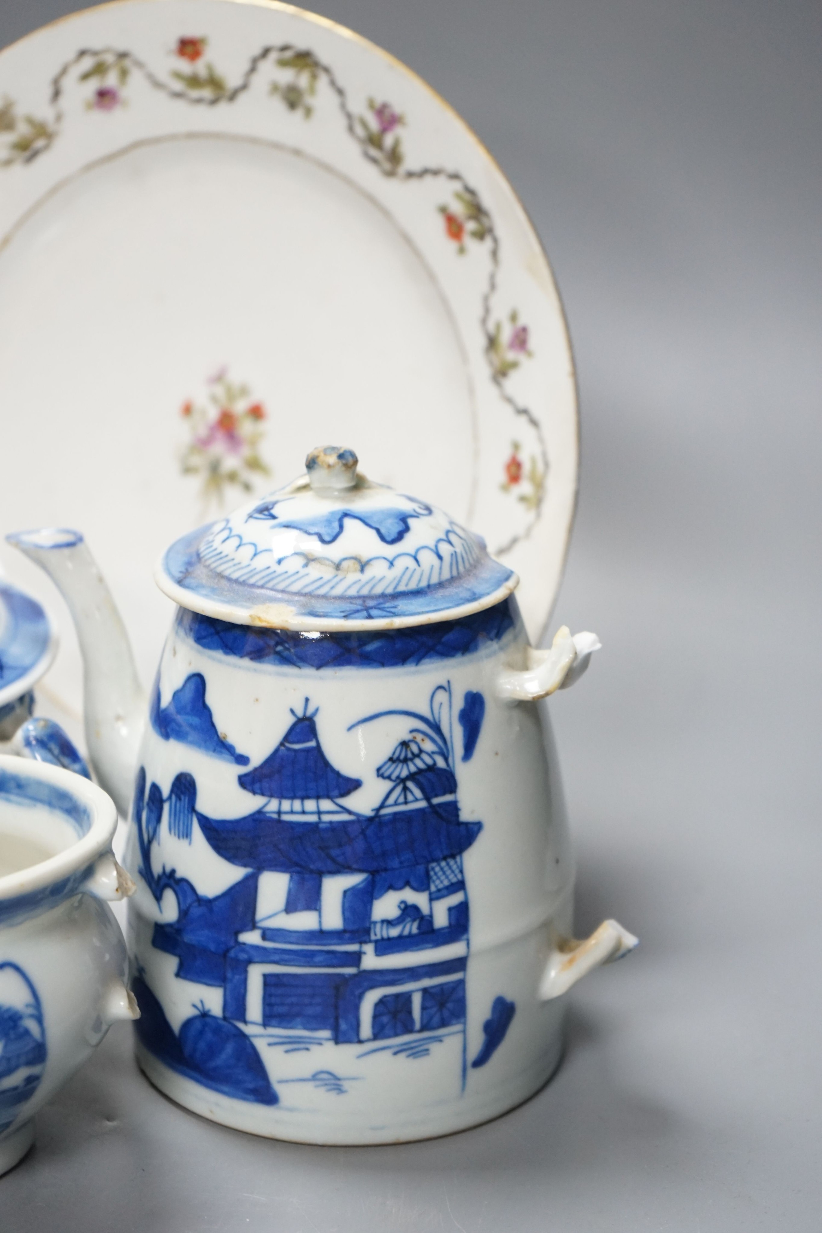 A Chinese blue and white bulb dish and a three piece teaset, a Delft plate and an English porcelain plate, 18th/19th century 23cm